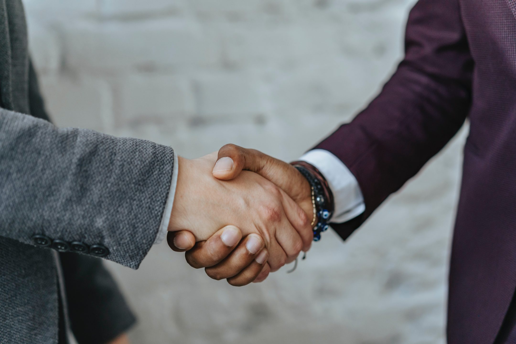 handshake representing commercial contract dispute